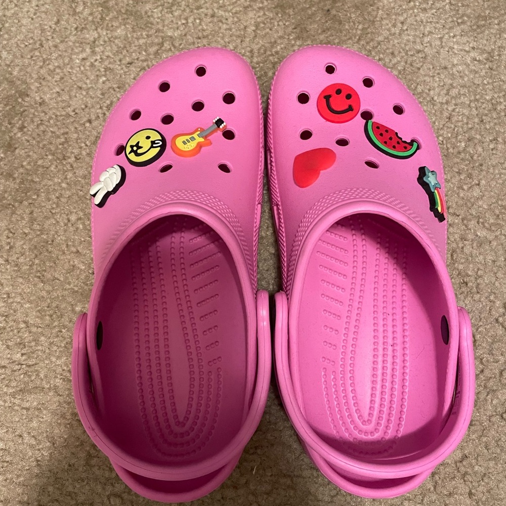 pink crocs size 9. jibets included